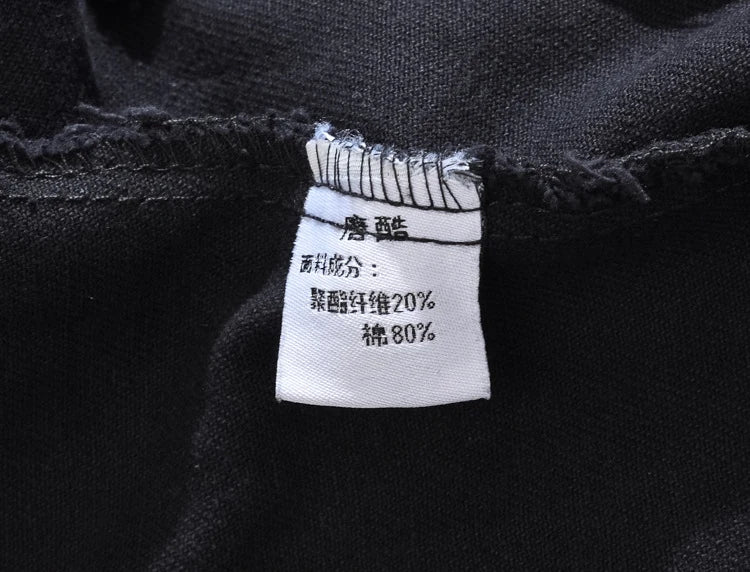Veste en jean noir avec trou à rivets