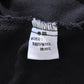 Veste en jean noir avec trou à rivets